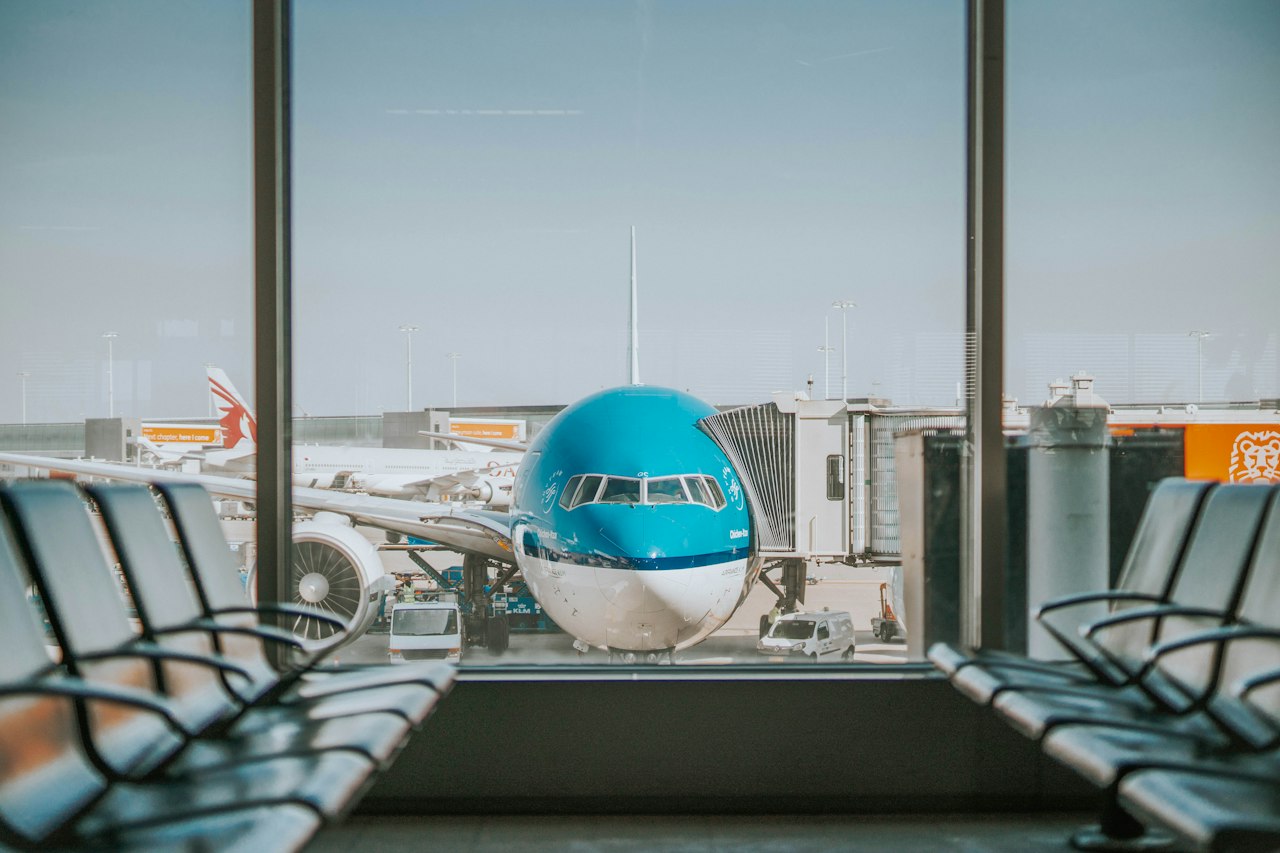 An aircraft parked at an airport gate