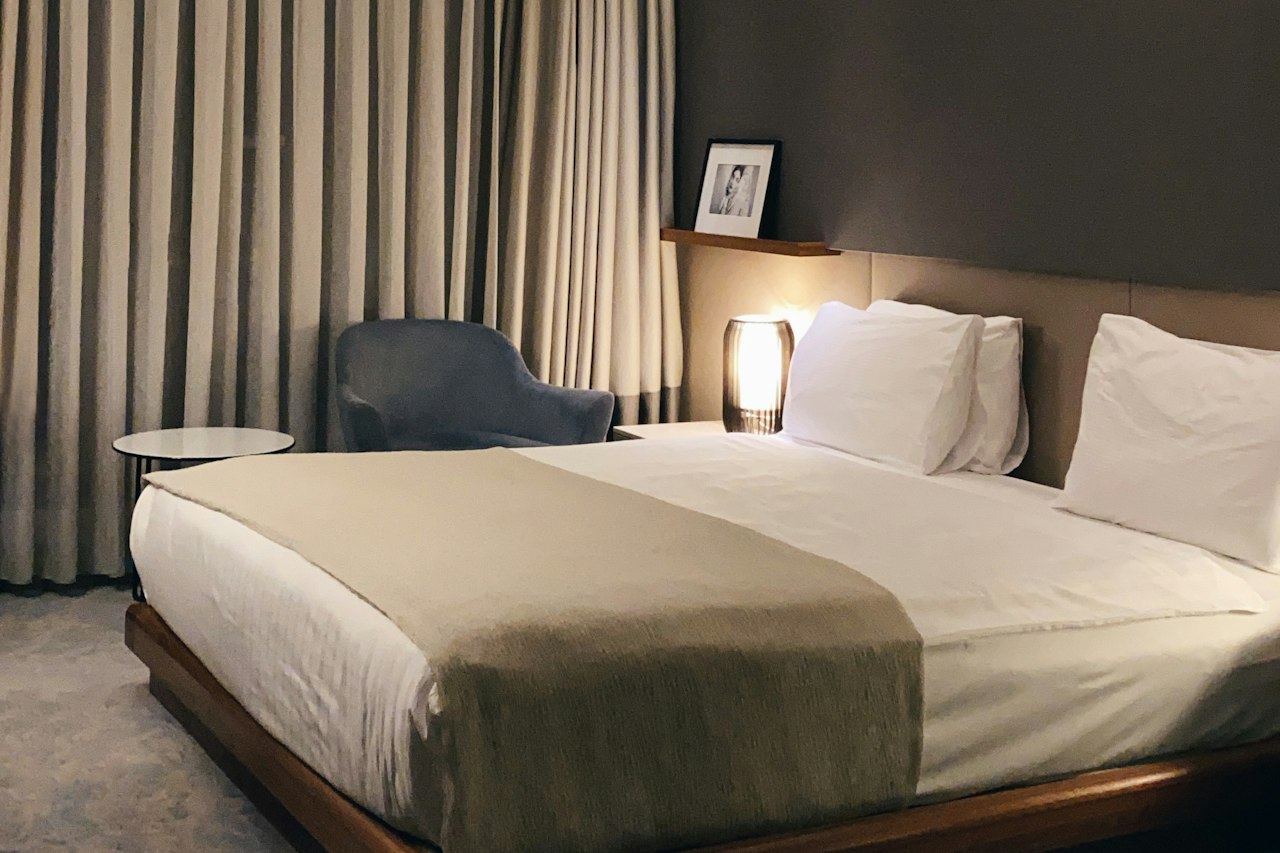 A calm, well-appointed hotel room